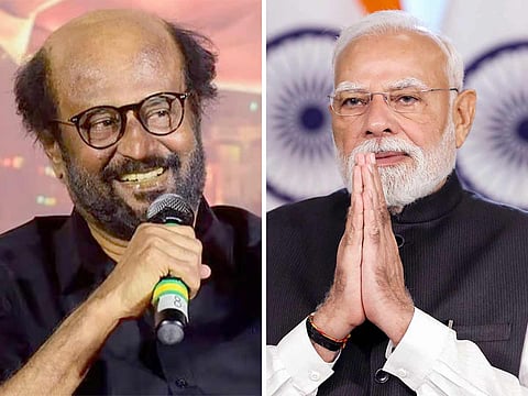 Modi Rajni PM Narendra Modi congratulates Rajinikanth on 50 years in Cinema