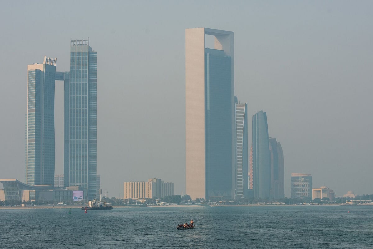 uae-air-defence-intercepts-threats-debris-injures-two-in-abu-dhabi