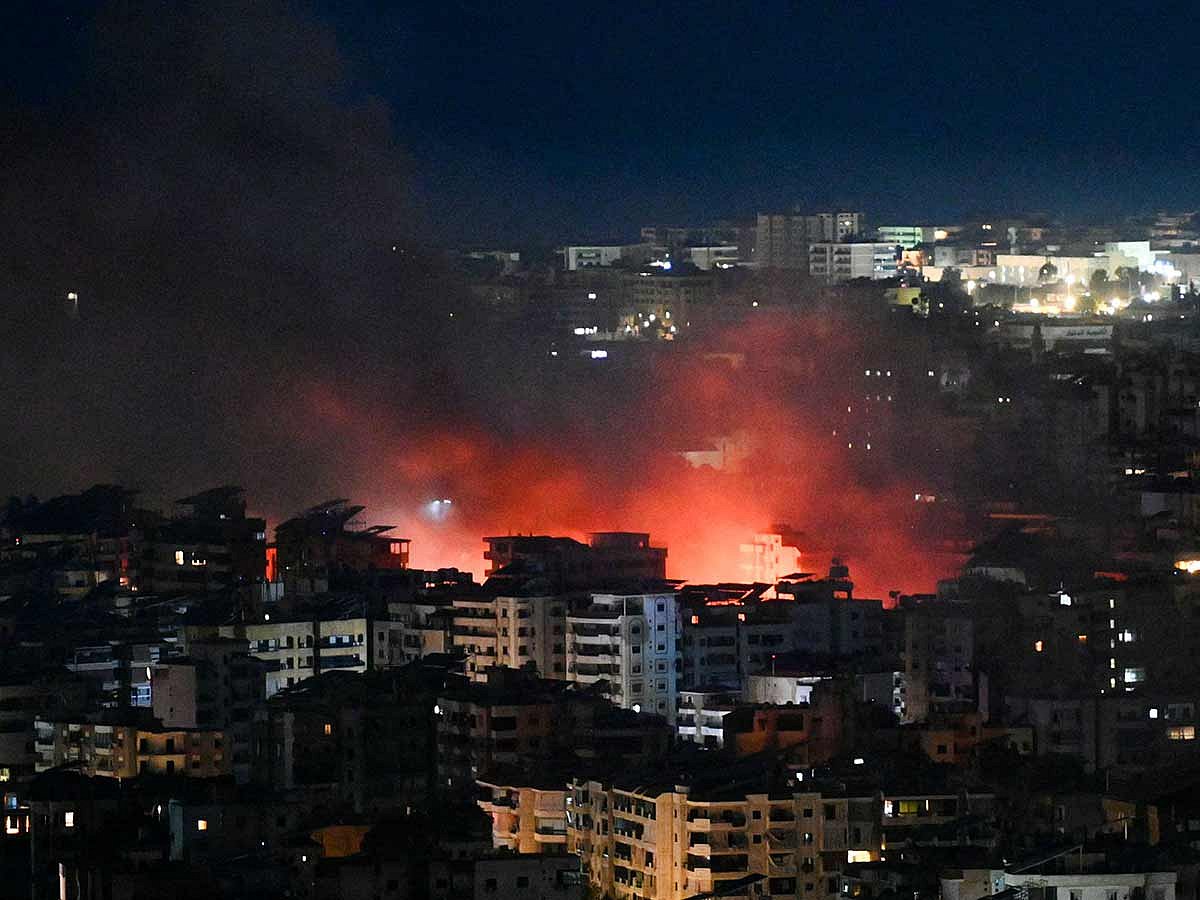 Fire rises from the site of an Israeli airstrike in the southern suburbs of Beirut 