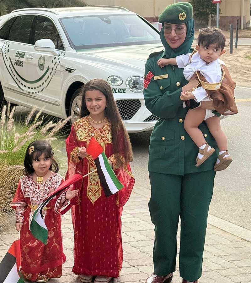 Dubai Police distribute UAE flags to boost community spirit