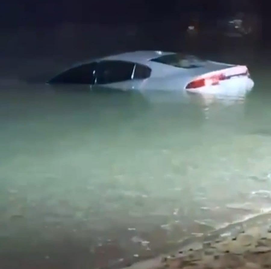 Sharjah heroes dive into sea to save trapped driver after car plunges ...