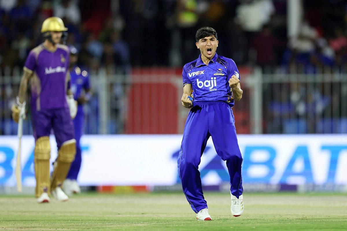 Muhammad Rohid delivers a forceful cricket pitch during an intense match for the DP World ILT20 tournament.