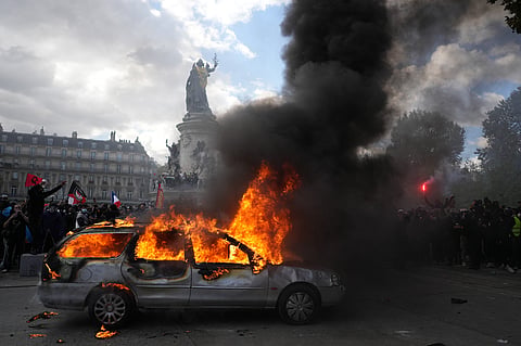 France's Economic Challenges: Debt, Spending, and Protests in Focus