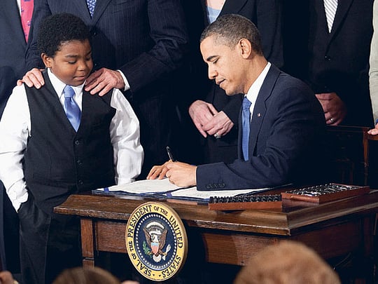 Obama uses 22 pens to sign Bill