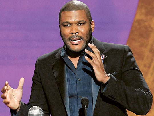 Movie mogul Tyler Perry plays Santa