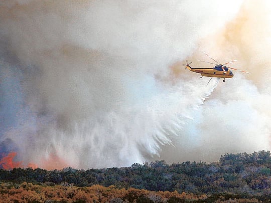 Wildfire's new path helps Texas firefighters