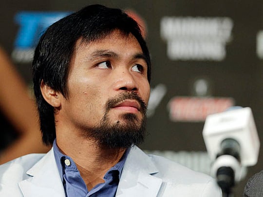 Crying Pacquiao ‘let Philippine fans down’