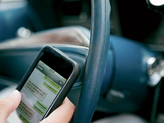 Sharjah Police cracking down on using phones while driving