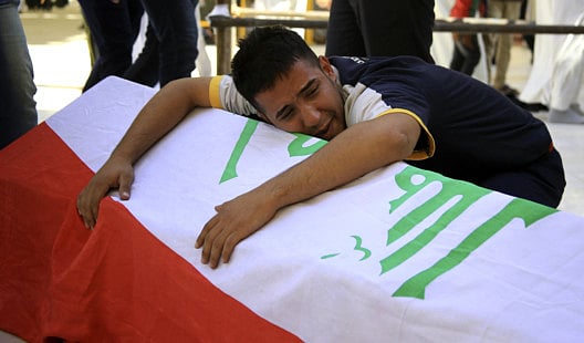 Iraqi Prime Minister Nouri Al Maliki warns of war of genocide as 48 killed