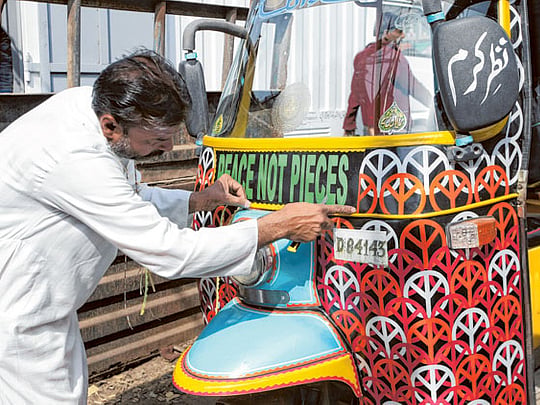 Eye-catching rickshaws promote peace in Pakistan