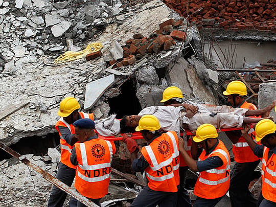 2 workers killed, 13 injured in garment factory building collapse
