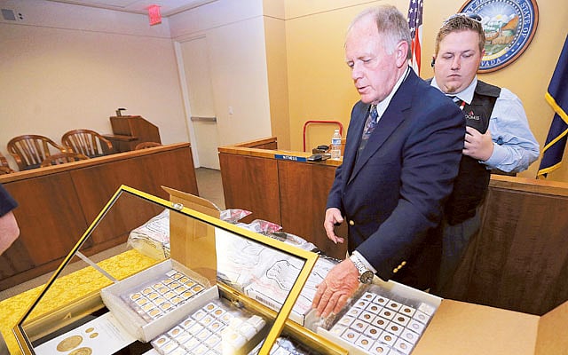 Gold fortune amassed by recluse goes to auction