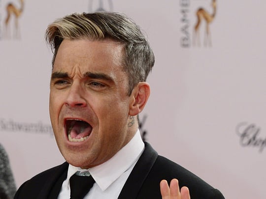 Williams launches album as former bandmates Take That hit No 1