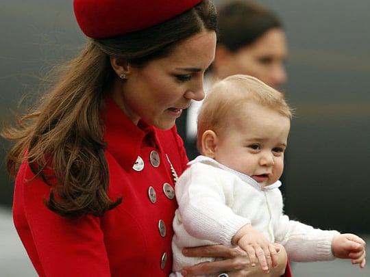 Wild weather greets baby Prince George on his first official tour