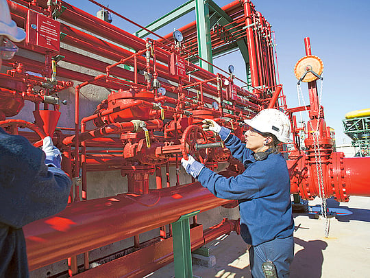 Oil holds gain after OPEC+ adds more output as market tightens