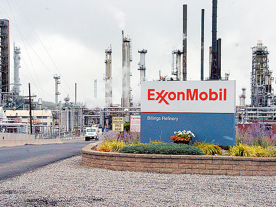 Exxon names Darren Woods as new CEO to replace Rex Tillerson