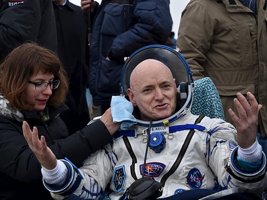 Nasa spaceman back from record year flight