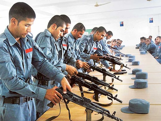 Afghan official: Taliban closing in on key city in the south