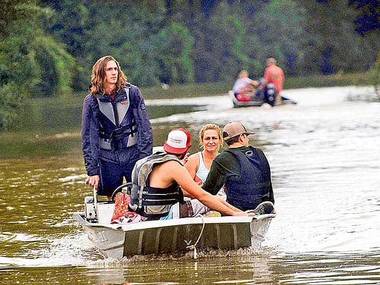 3 killed, thousands rescued in southeast Louisiana floods