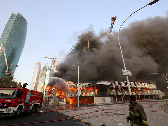 3 firefighters injured in massive fire in Kuwait building