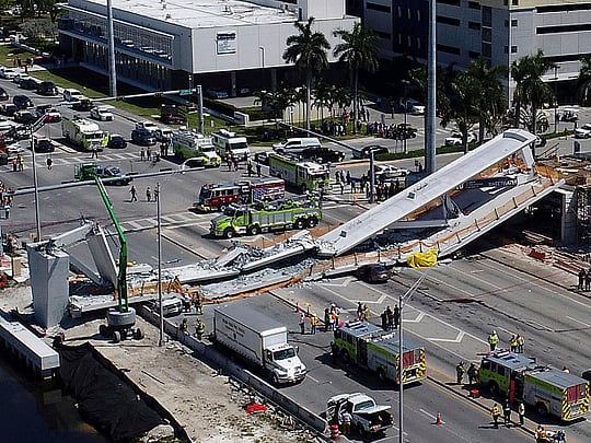 4 confirmed dead as new Miami footbridge collapses