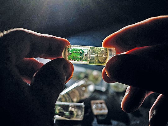 This futuristic pill senses signs of disease inside the body, then ...