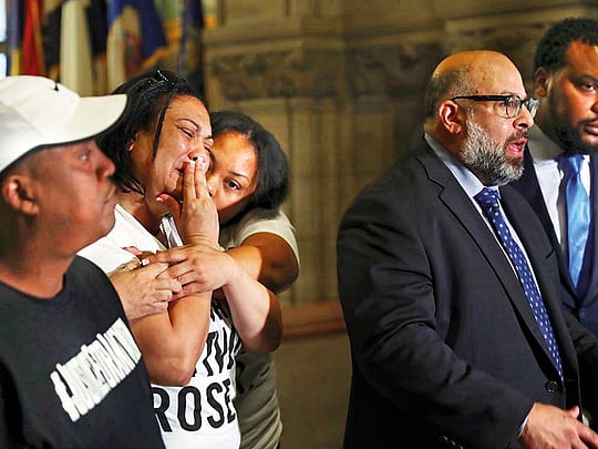 Officer charged in death of black teen who was shot in back