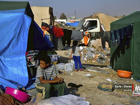Thousands of displaced Syrians return home after ceasefire deal