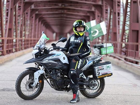 Woman biker dedicates ride to brave Pakistani women