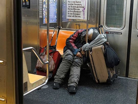 Photos: New York's homeless flock to empty subway trains
