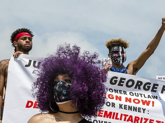 Protests swell across America as Floyd is mourned near his birthplace