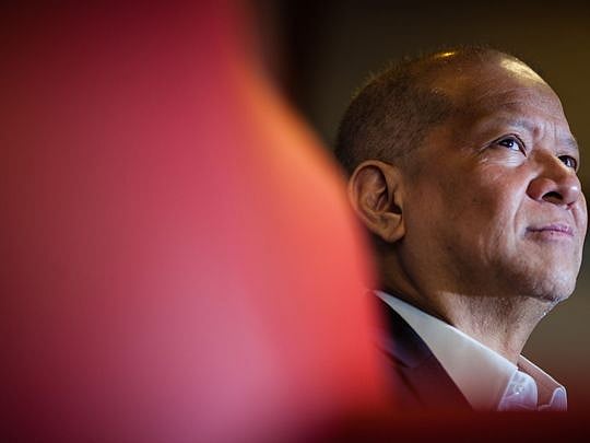 Philippine billionaire Ang boosts stake in San Miguel parent