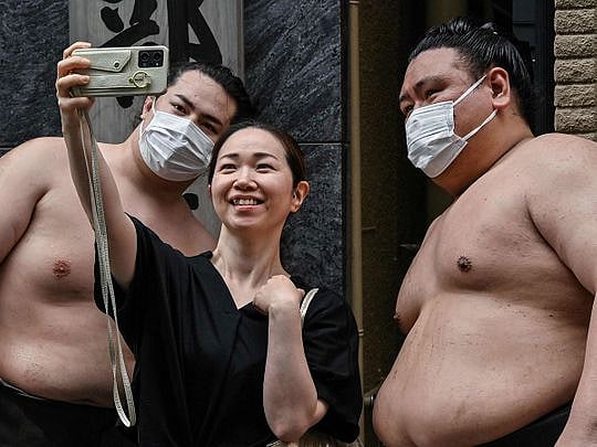 Photos: Tourists flock to Japan on renewed interest in Sumo