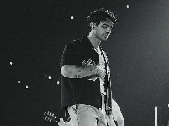 Singer Joe Jonas sheds a tear onstage for his wife and Hollywood star ...