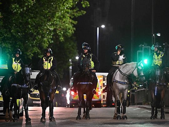 6,000 specialist police officers stand ready to quell UK riots