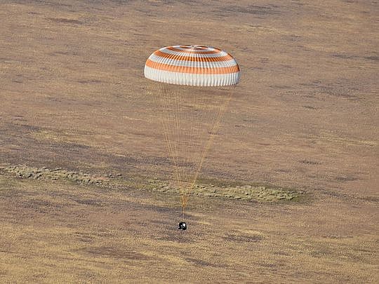 Russian cosmonauts return to Earth after record ISS stay