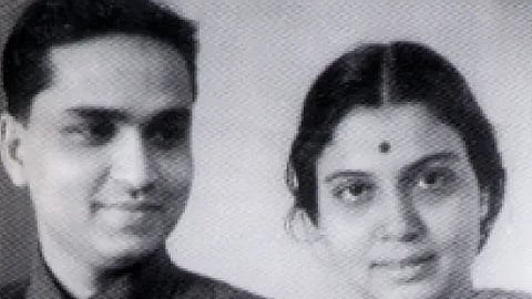 A beaming Kumara Gandharva with his wife Bhanumati