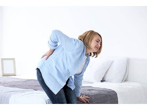 woman with back pain