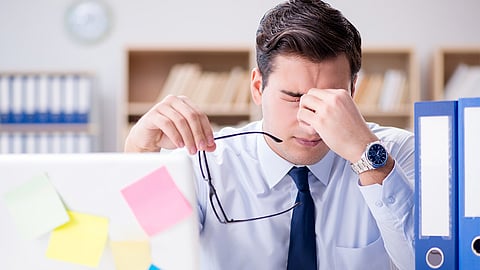 Stressed out man at work