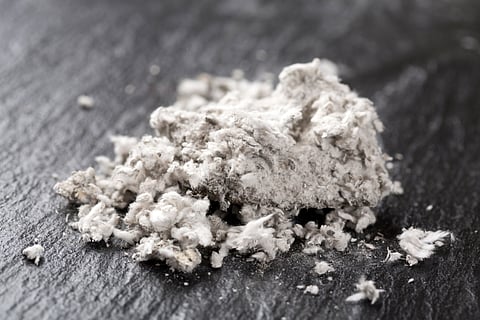 small pile of wood shavings asbestos