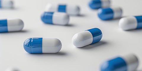 antibiotic capsule pills on white background. Pile of antibiotic drug Generative AI