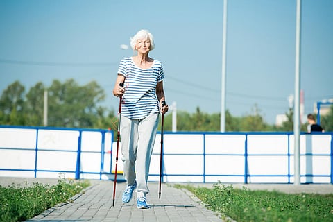 senior exercise walking older woman geriatric
