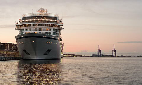 Bow of a large cruise ship at dusk moored in Copenhagen harbor in Denmark