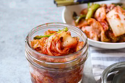 Homemade kimchi in a jar close up, selective focus
