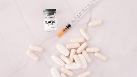 Vial and pills of fentanyl, an opioid responsible for the drug addiction and abuse death crisis in the united states.