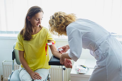 nurse preparing to make an injection for blood taking. Medical test.