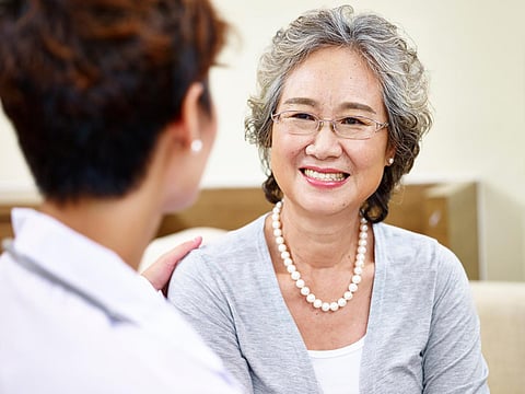 senior Asian woman doctor