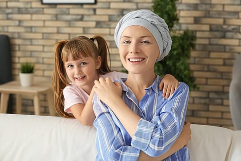 Little girl and her mother after chemotherapy at home