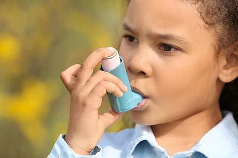 A Girl with Her Inhaler 