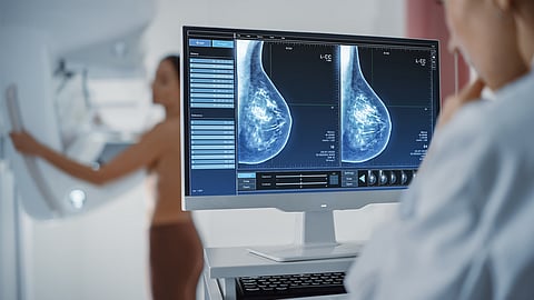 Woman getting mammogram